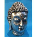 A silver coloured Buddha's Head
