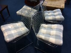 A set of four Bertoia style chairs