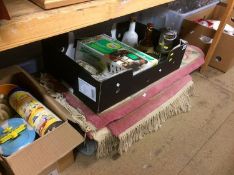 Shelf of assorted including a Miner's lamp, rugs etc.