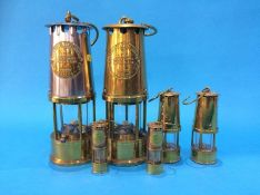 Two Eccles Miners lamps and four miniature lamps