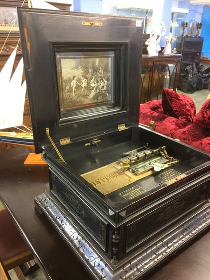 A Nicole Freres Ltd Polyphon in a carved and ebonised case, with a monochrome panel of Musical - Image 11 of 20