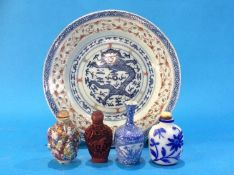 An Oriental plate decorated with mythical Dragon, a small Chinese blue and white vase, 9.5 cm high