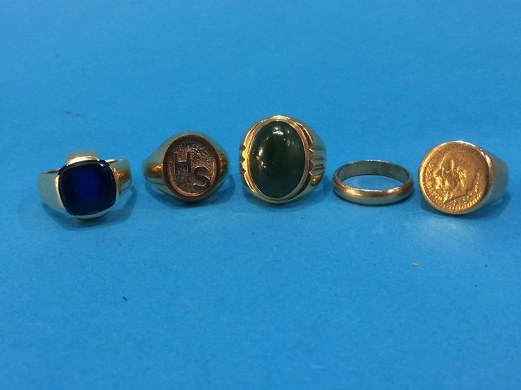 A collection of various Continental yellow metal rings