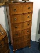 A narrow bow front chest of drawers, 46cm wide