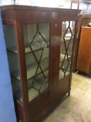 An Edwardian china cabinet