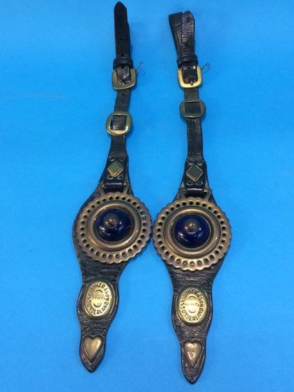 A pair of leather Horse brasses stamped 'Strother and Sons Makers Sunderland'