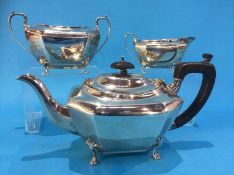 A silver three piece tea set, Birmingham, 1931, various makers marks. Weight 33.8 oz