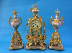 A French gilt three piece clock garniture, the clock with 8 day movement and strike action, set with