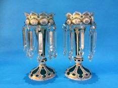 A pair of Victorian green lustres with white and gilt flashed decoration and octagonal waisted