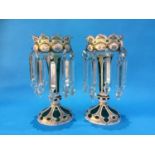 A pair of Victorian green lustres with white and gilt flashed decoration and octagonal waisted