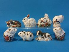 Eight Royal Crown Derby paperweights; three 'Mice', 'Vole', two 'Rabbits', 'Dog' and a 'Cat' (8)