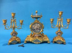 A Good French Ormolu clock garniture, the clock with porcelain dial, 8 day movement, strike