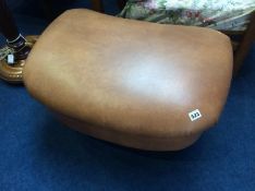 A Laura Ashley brown leather footstool