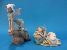 A Lladro figure, number 7690 and another number 7694