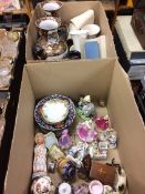Two boxes of assorted china to include Fairings and other figures