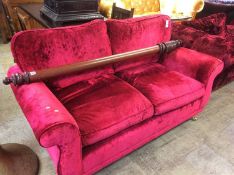 A Laura Ashley crushed red two seater settee