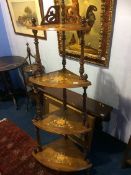 A Victorian walnut four tier graduated corner what not