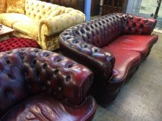 A Chesterfield settee and armchair