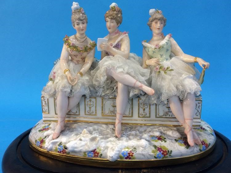 A late 19th century Continental porcelain group of three young Ladies seated on a bench, under a - Image 3 of 8