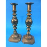 A pair of brass candlesticks