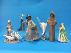 Six Lladro figures to include; a Monk, two girls, Dove etc.