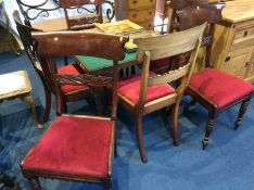 A set of six 19th century mahogany dining chairs with solid cresting rail, drop in seats and