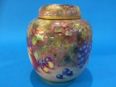 A Royal Worcester vase and cover by John Freeman, decorated with peaches, grapes and cherries,