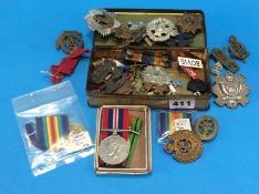 Collection of medals (World War II), cap and shoulder badges