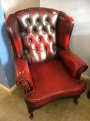 A Chesterfield high back wing armchair