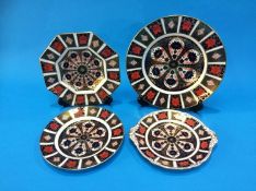 Four various Imari plates, red marks, numbered 1128