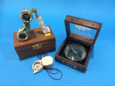 Pair of reproduction opera glasses and two compasses