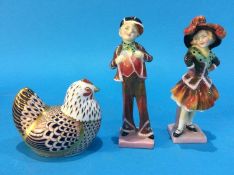 A Royal Doulton figure group 'Pearly Boy and Pearly Girl', HN 2035 and 2036 and a Royal Crown