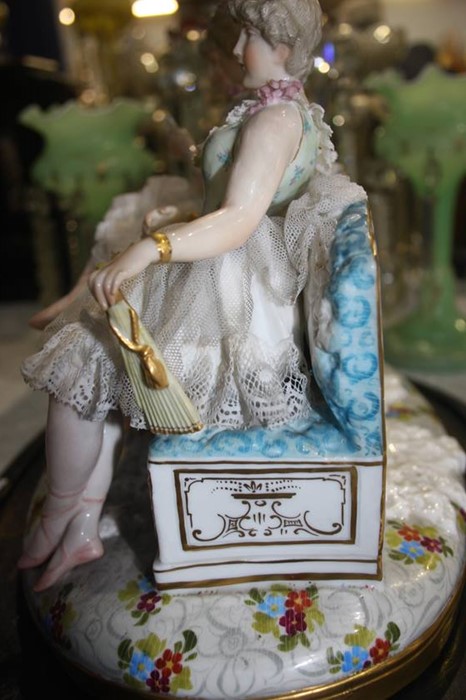 A late 19th century Continental porcelain group of three young Ladies seated on a bench, under a - Image 6 of 8