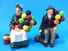 A Royal Doulton 'The Balloon Man', HN 1954 and 'The Old Balloon Seller', HN 1315