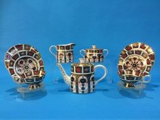 A Royal Crown Derby Imari tea service comprising; two trios, teapot, cream jug and sugar bowl (9)