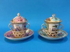 Two Dresden porcelain chocolate cups and covers, one decorated with romantic panels on a pink and