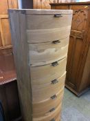 A Barker and Stonehouse 'Navajos' narrow chest of drawers with seven short drawers, 39.5cm wide