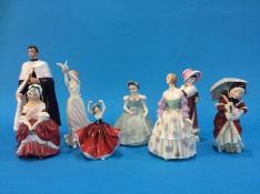 A Royal Doulton 'Prince of Wales' and seven Royal Doulton Ladies, various