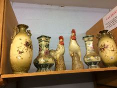 Two pairs of vases and a pair of Cockerels