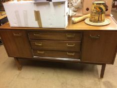 A G Plan sideboard and a pair of balloon back chairs