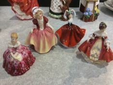Four mini Royal Doulton figures