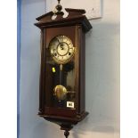 Modern mahogany wall clock