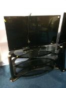 Hitachi colour TV and stand (remote in office)