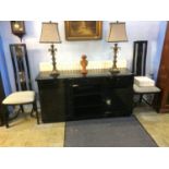 A modern ebonised sideboard with two single chairs