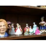 Various Royal Doulton figures , Toby jugs etc.