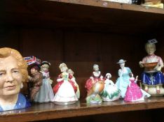 Various Royal Doulton figures , Toby jugs etc.