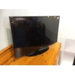 Samsung colour TV (remote in office)