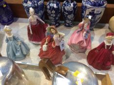 Five Royal Doulton figures