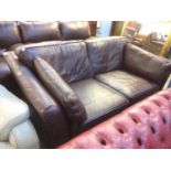 Brown leather settee