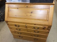 Desk and pine bureau and pine mirror